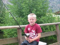 Child fishing at Talk Tech Camp